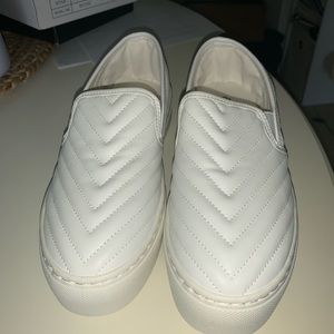 White slip on vans